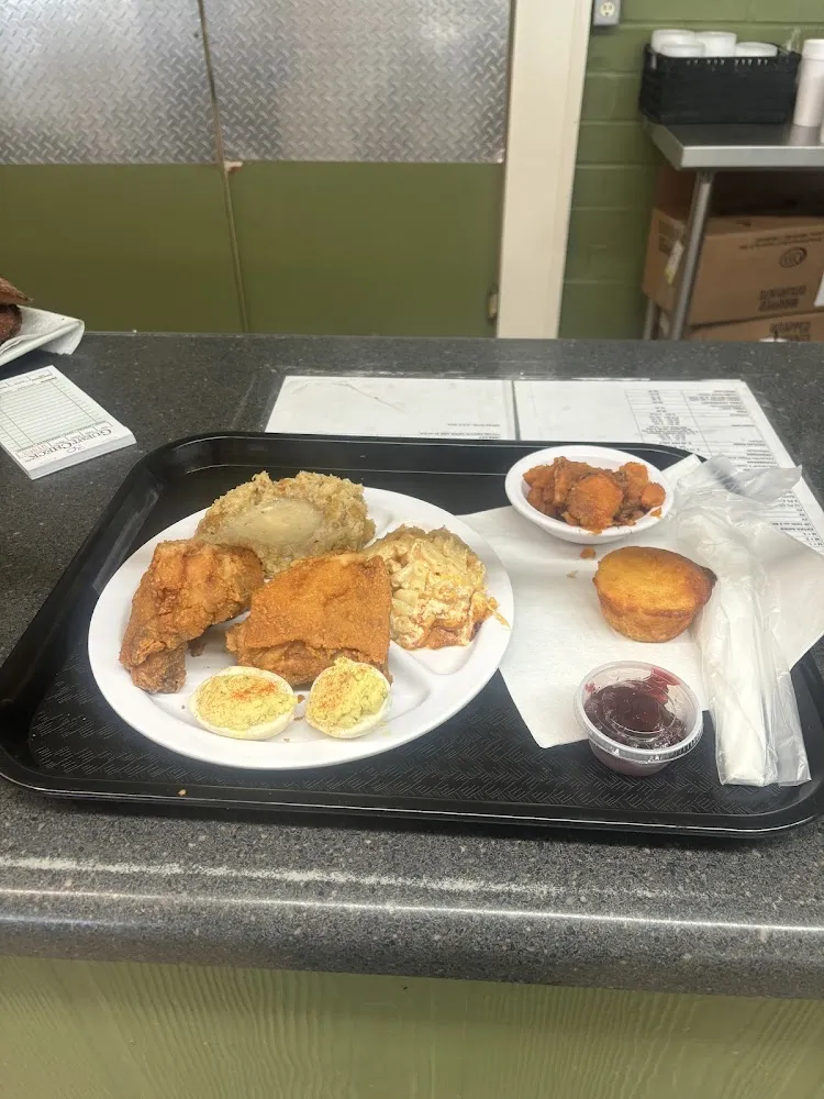 Fried Chicken Dressing Mac and Cheese Yams Deviled Eggs and Cranberry Sauce